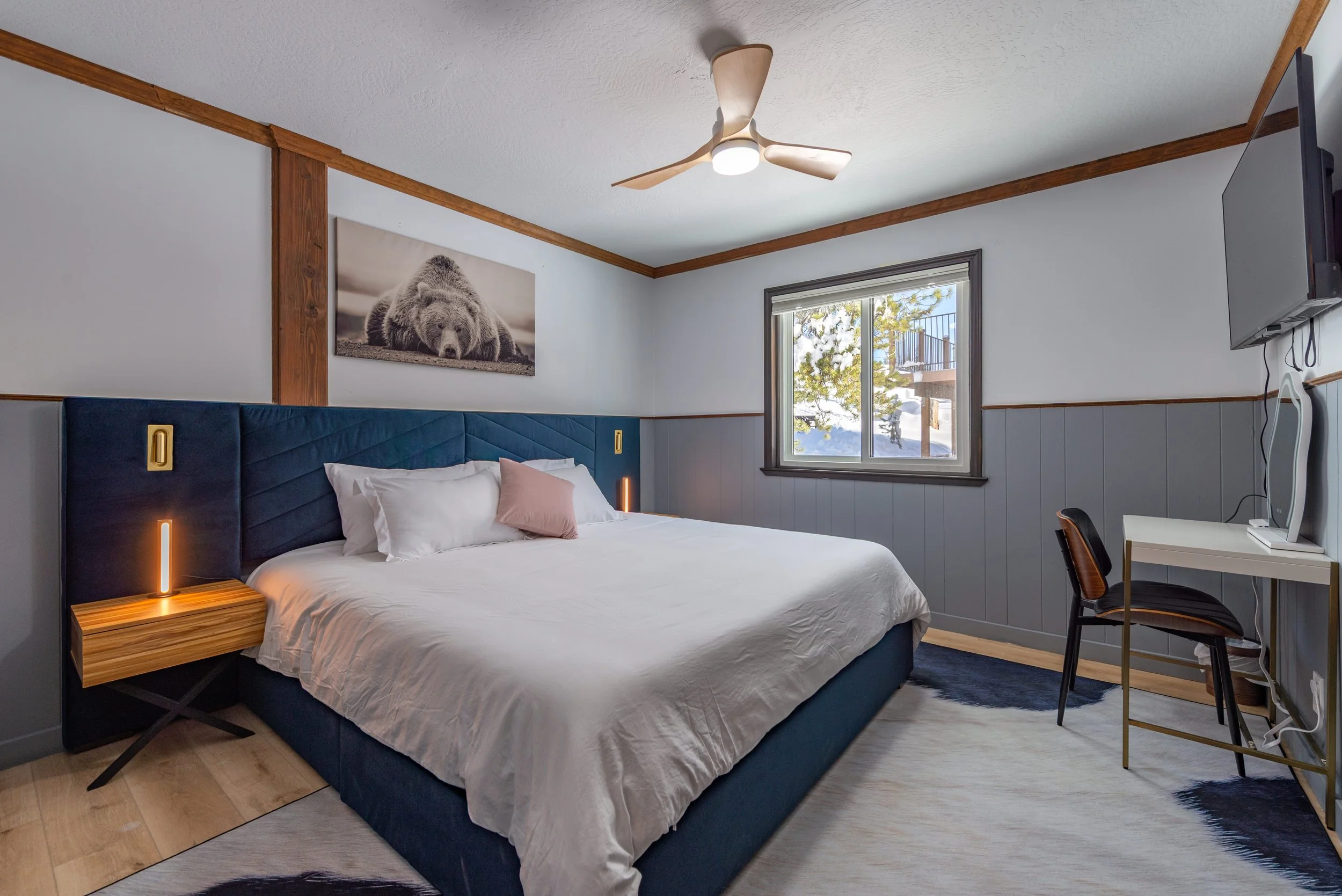 Renovated bedroom with velvet headboard